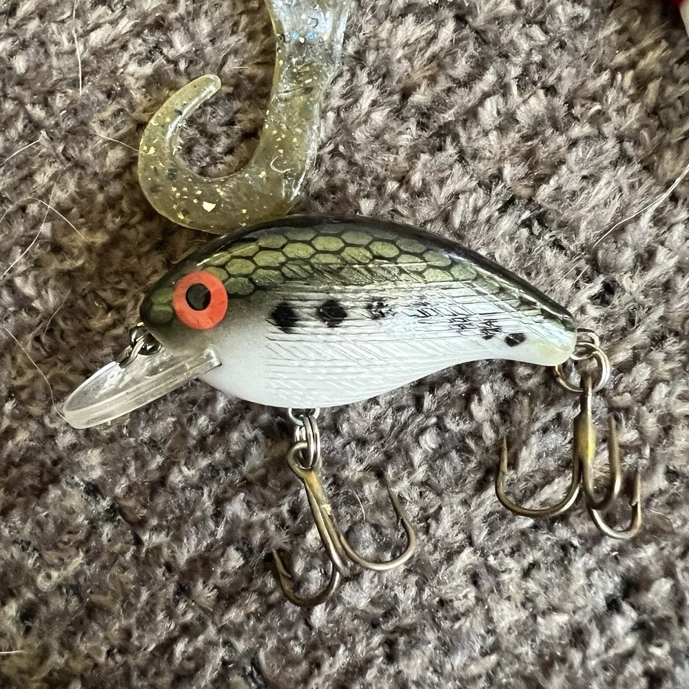 Plano Tackle Box Lot with Rebel Lure Bucktail Jigs Hooks Swivels and Hand Reel